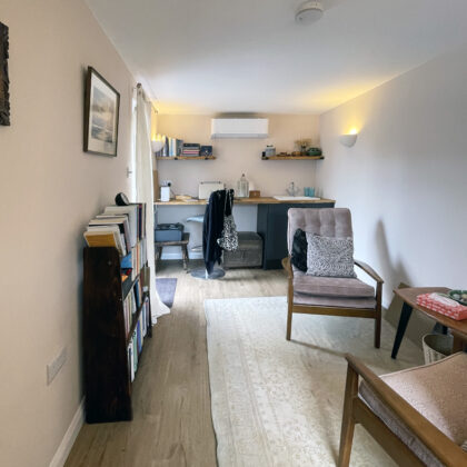 Converted garage home office with bespoke workspace and seating area created as part of a Whitstable house renovation.